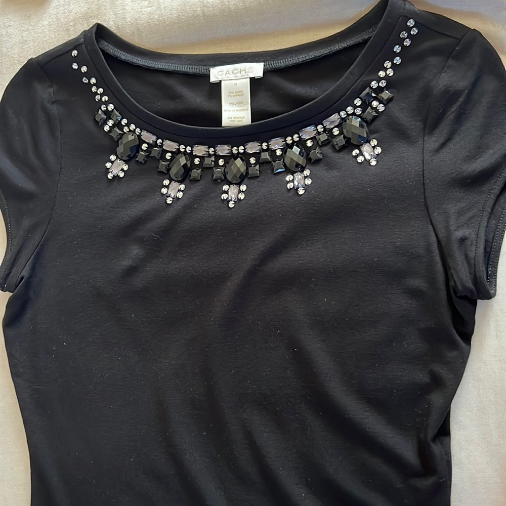 Black short sleeve top with black and grey stone neckline